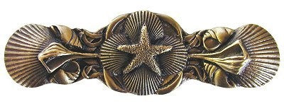 Notting Hill Cabinet Pull Seaside Collage Antique Brass  4" x 1-1-4" - cabinetknobsonline