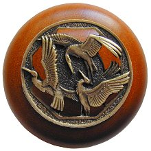 Notting Hill Cabinet Knob Crane Dance-Cherry Antique Brass 1-1-2" diameter - cabinetknobsonline